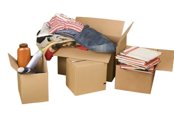 Transport cardboard boxes with books and clothes — Stock Photo, Image
