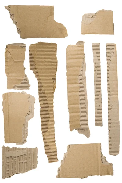 Pezzi di cartone ondulato marrone strappato — Foto Stock