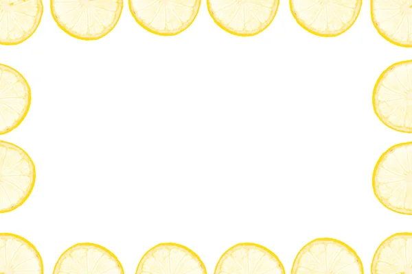 Quadro feito de fatias de limão amarelo — Fotografia de Stock