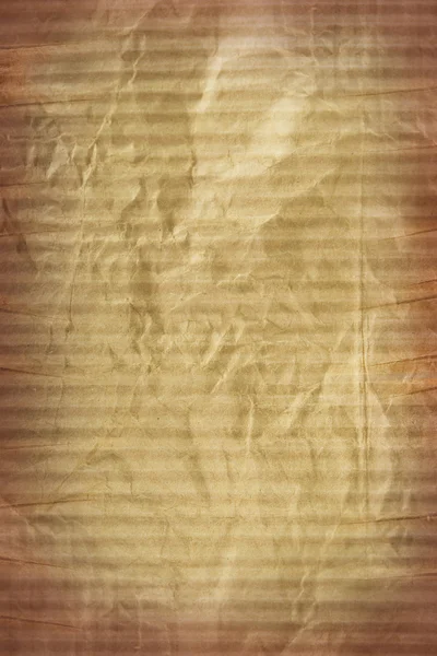 Текстура картонной скомканной коричневой бумаги — стоковое фото