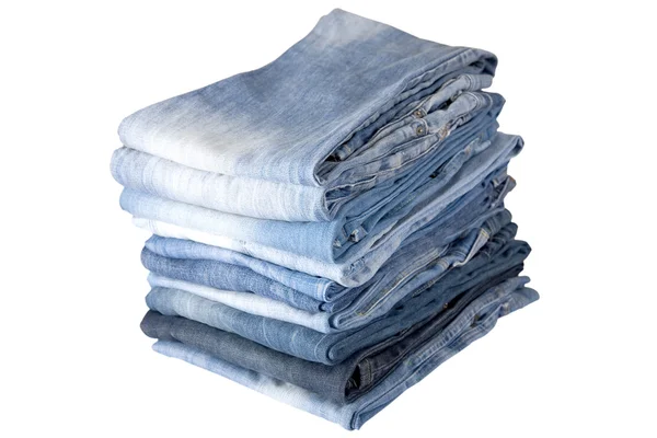 Stack of blue denim jeans — Stock Photo, Image