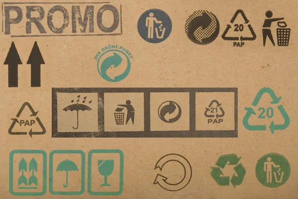 Símbolos diferentes de caixas de papelão — Fotografia de Stock