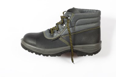 Black footwear, equipment for workers clipart