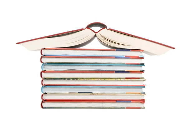 Color tower books arranged in house shape — Stock Photo, Image