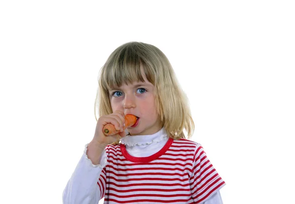 Girl with carrot — Stock Photo, Image