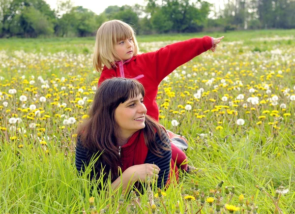Mother and daughter on a meadow — Stock Photo, Image