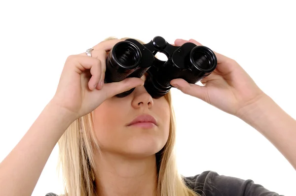 Mladá žena s dalekohledem — Stock fotografie