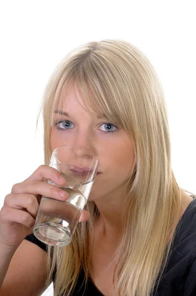 Young woman drinks water — Stock Photo, Image