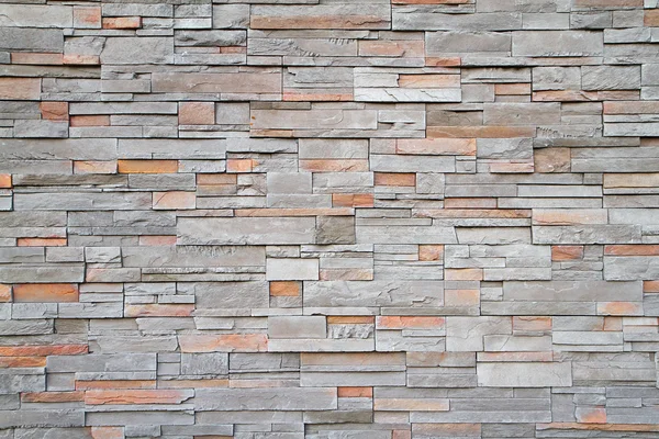 Vierkante stenen muur ver — Stockfoto
