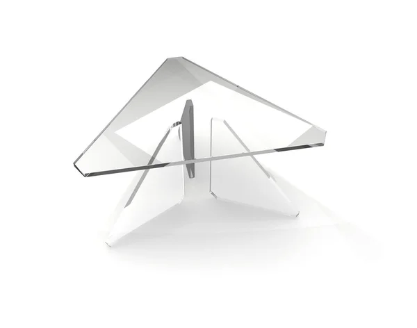Треугольный стеклянный стол — стоковое фото