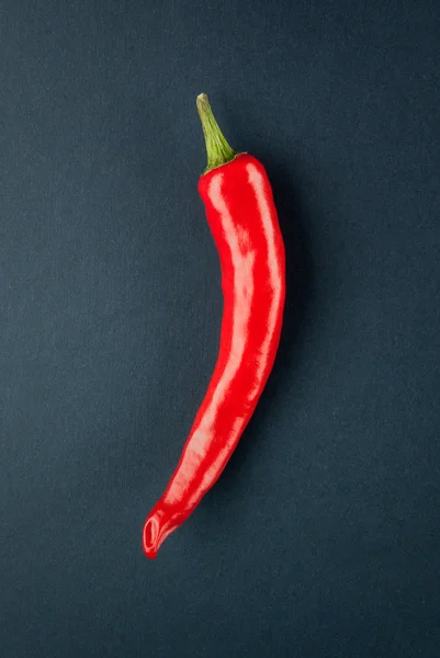 stock image Red chilli on black background