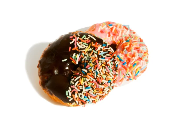 Twee donuts op wit — Stockfoto