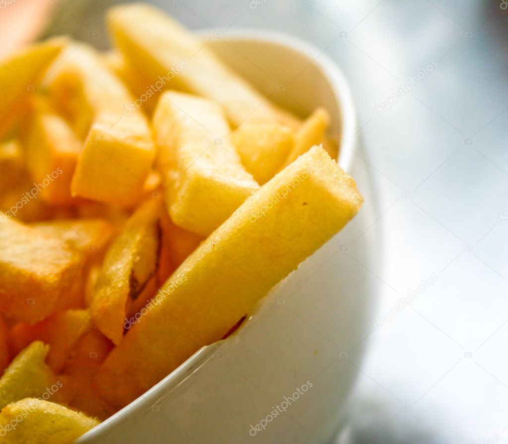 A bowl of french fries or hot chips