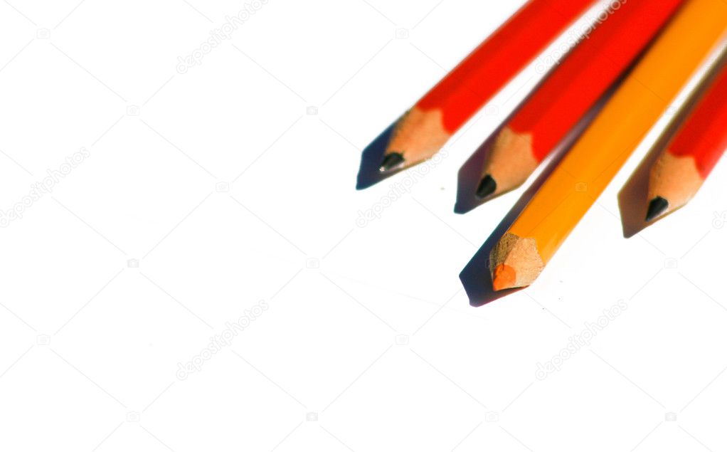 Pencils with focus on the orange colored pencil