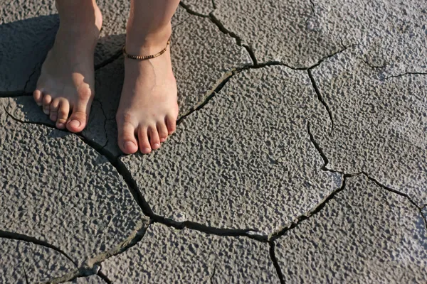 stock image foot and desert ground