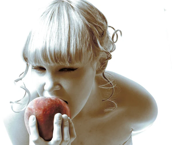 Девочка и яблоко — стоковое фото