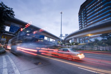 Highway at night with light trails clipart