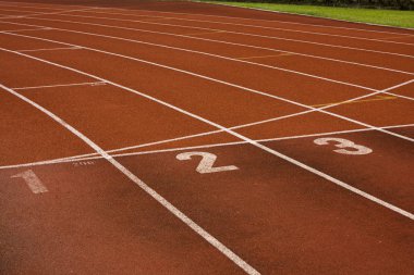 Running lanes on a track in play gorund clipart