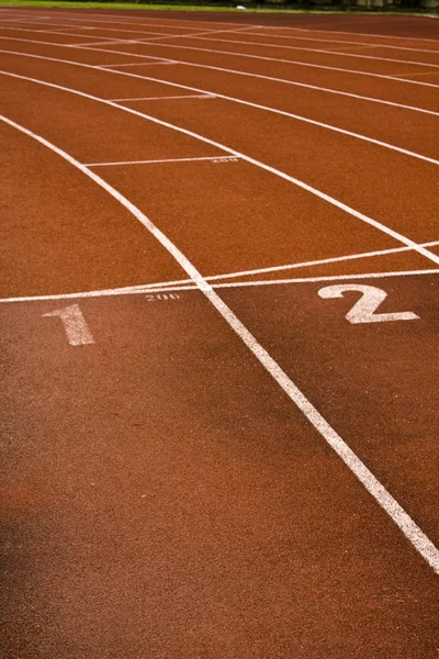 Running lanes on a track in play gorund — Stock Photo, Image