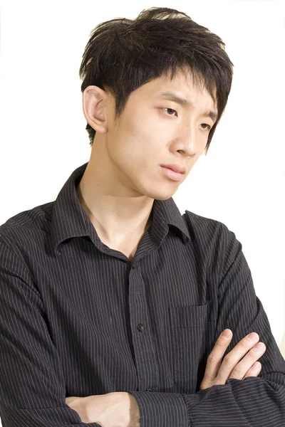 Asiatischer Mann in Denkpose isoliert auf weißem Hintergrund. — Stockfoto