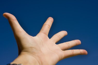 Hand on sky,looking for help clipart