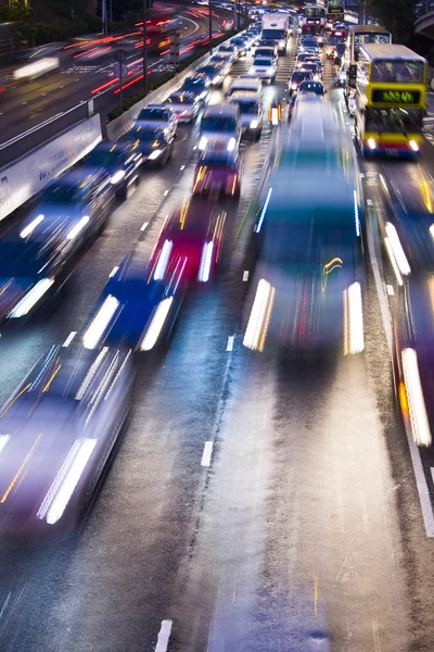 Trafikljus i rörelse suddig — Stockfoto