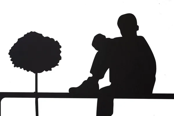 Silhouette of doing something — Stock Photo, Image