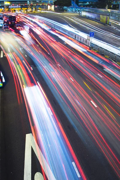 Trafikljus i rörelse suddig — Stockfoto