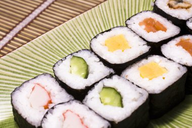 Japanese sushi on a plate clipart