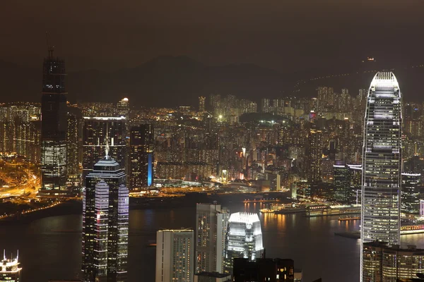 Hong kong kowloon skyline in de nacht — Stockfoto