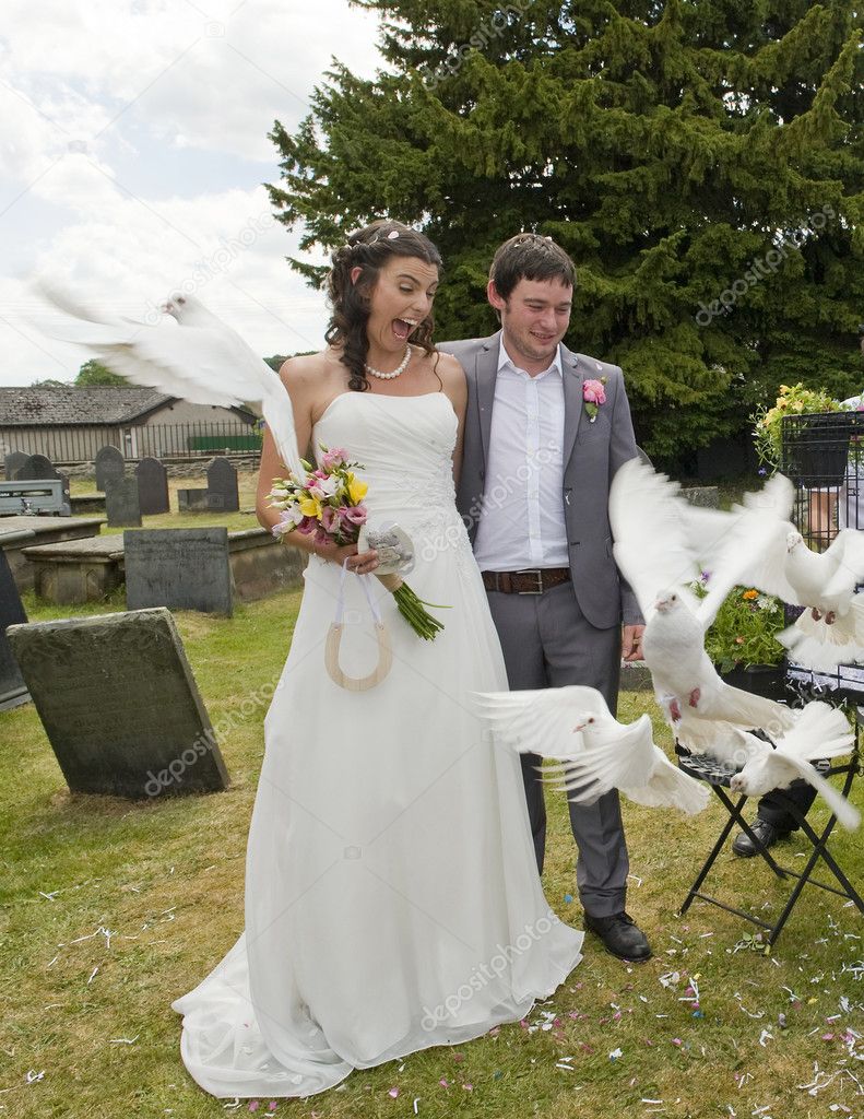 Bride and Groom release doves