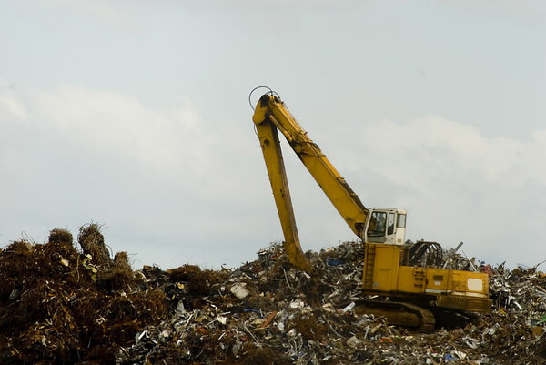Bulldozwer working on a waste disposal