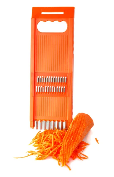 Терка и морковь — стоковое фото