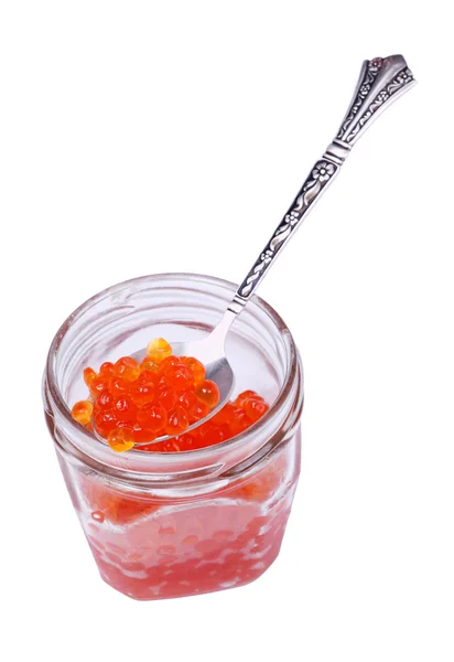 Red caviar on silver spoon — Stock Photo, Image