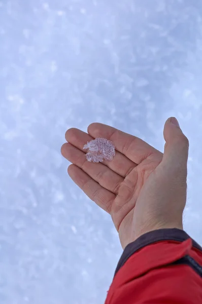Winter crystal on palm — Stock Photo, Image