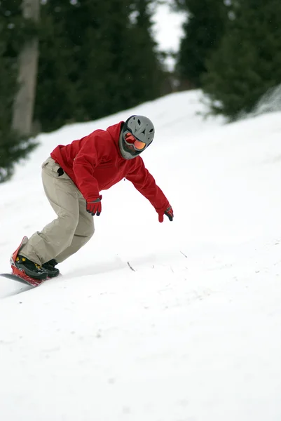 Snowboarder skipiste inschakelen — Stockfoto