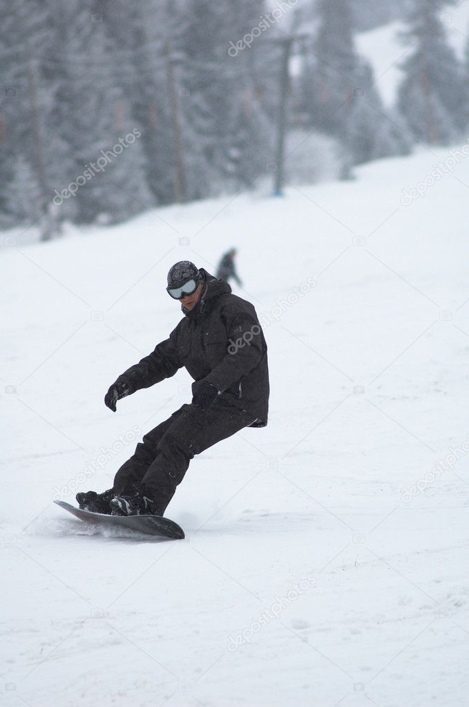 Snowboarder in snowfall