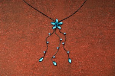 Blue necklace and brown texture clipart