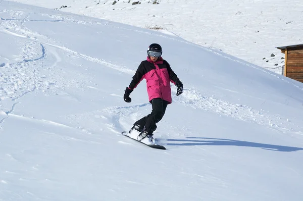 Roze snowboard meisje — Stockfoto
