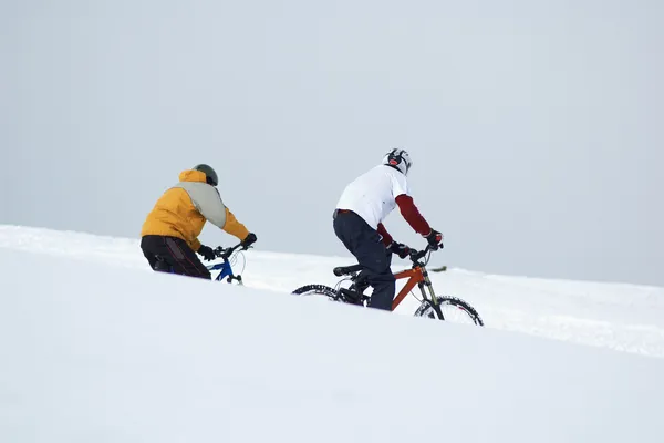 Motociclistas de neve — Fotografia de Stock