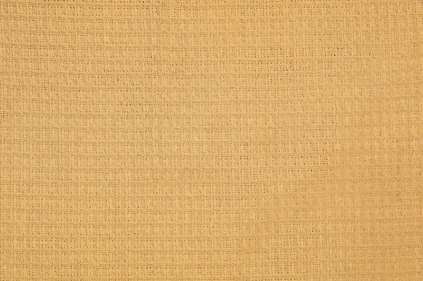 Textura de pano de waffle laranja-claro — Fotografia de Stock