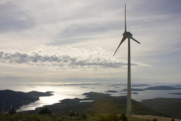 Wind turbine with sea in background Stock Image