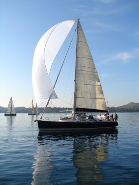 Yacht on calm sea clipart