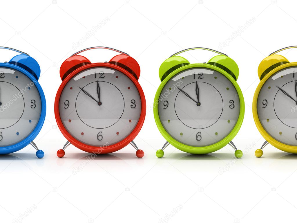 Four colourful alarm clocks