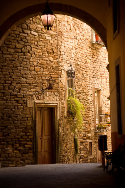 A narrow passageway with stone building facade in downtown Guanajuato, a World Heritage Site