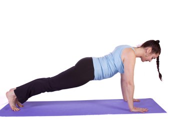 Yoga pozisyonunda bir kadın