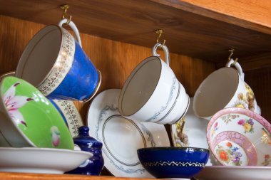 China Cabinet full of Cups clipart