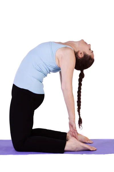 Yoga pozisyonunda bir kadın — Stok fotoğraf