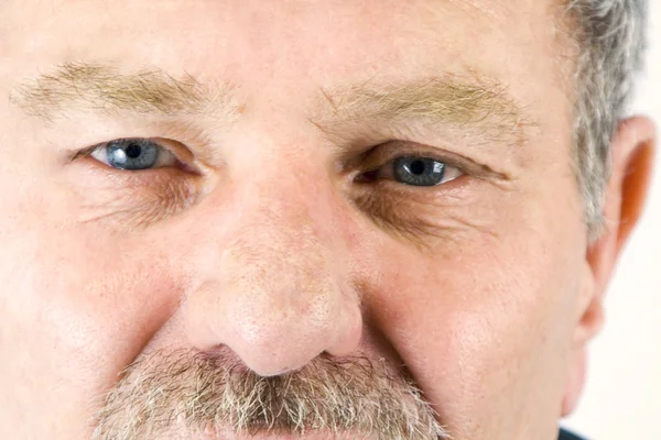 stock image Close up on the face of a baby boomer