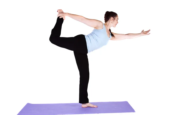 Yoga pozisyonunda bir kadın — Stok fotoğraf